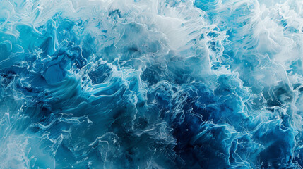 Fototapeta premium The image is of a large wave in the ocean, with a blue and white color scheme