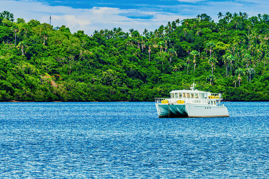 Boat anchored off the coast of Haligi Beach, Puerto Galera, Mindoro island, Philippines