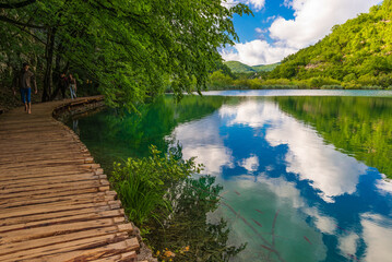 Tourist walking trail along a lake rich in fish