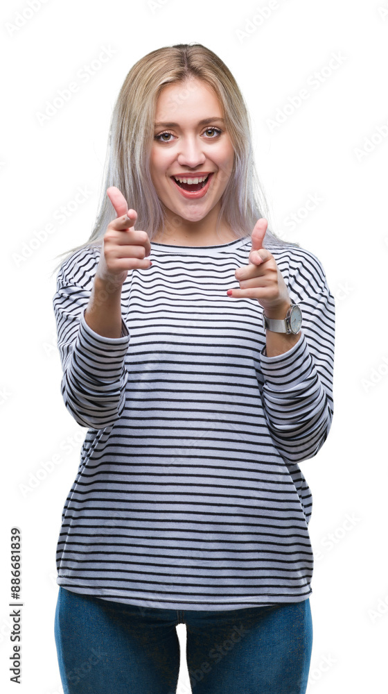 Poster young blonde woman over isolated background pointing fingers to camera with happy and funny face. go