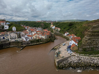 Clinging to the hillside, Staithes is an unmissable destination to explore. From the winding cobbled streets to the charming 18th century cottages, you’ll find this coastal village is full of characte