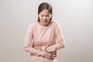 Flatulence asian young woman intolerance hand in stomach ache, suffer from food poisoning,...