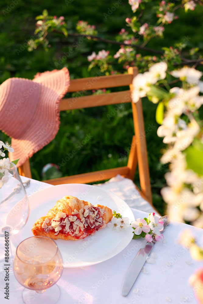 Poster Stylish table setting with beautiful spring flowers in garden