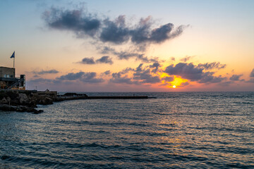 Sunset over the Mediterranean Sea at Caesarea National Park in Israel.
