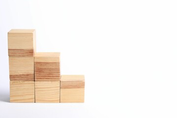 Many blank wooden cubes on white background, space for text