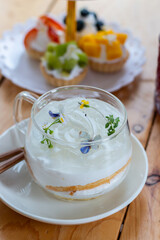 Delicious young coconut cake, fresh coffee shop,delicious young coconut cake,Coconut cake with young coconut on top.