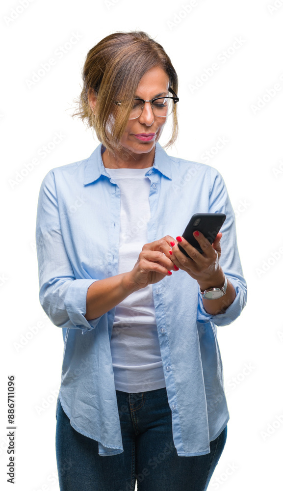 Wall mural middle age senior woman texting sending message using smartphone over isolated background with a con