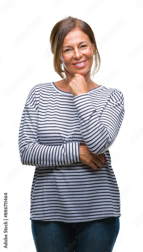 Wall mural middle age senior hispanic woman over isolated background looking confident at the camera with smile