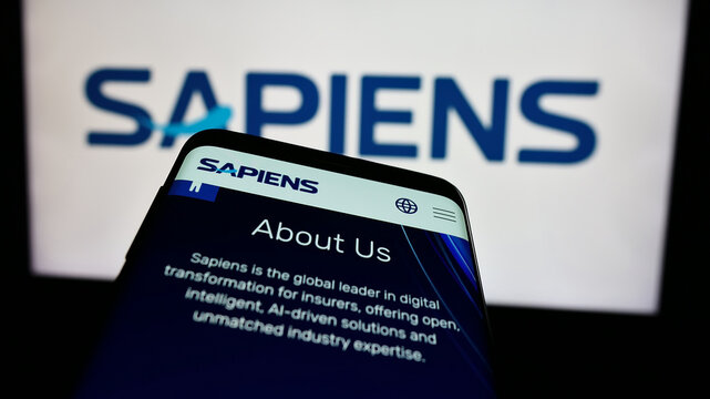 Stuttgart, Germany - 07-08-2024: Smartphone with webpage of Israeli company Sapiens International Corporation N.V. in front of business logo. Focus on top-left of phone display.