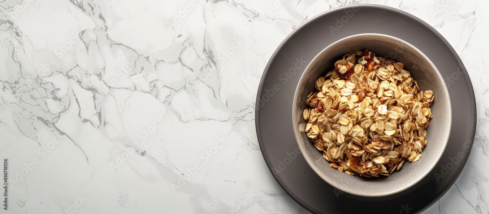 Poster stone table backdrop with a saucer holding dry muesli emphasizing a healthy breakfast concept with a