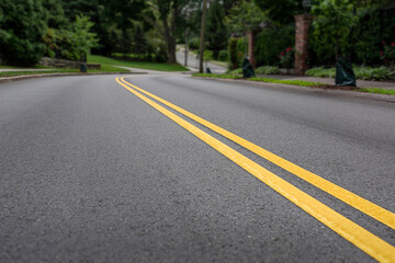 Newly Paved Road with Fresh Yellow Center Lines