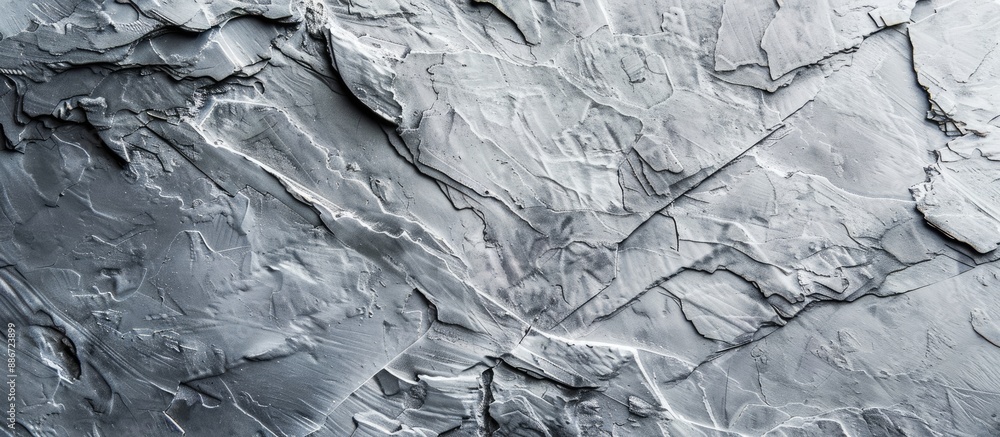 Poster background with a textured gray scratched stone featuring copy space image