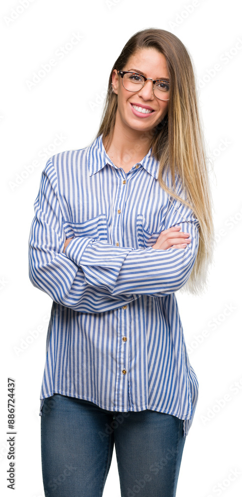 Wall mural Beautiful young woman wearing elegant shirt and glasses happy face smiling with crossed arms looking at the camera. Positive person.