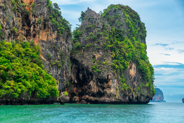 Rocky island on Phra Nang beach, Railay Bay, Krabi, Thailand. Summer vacation and holiday background