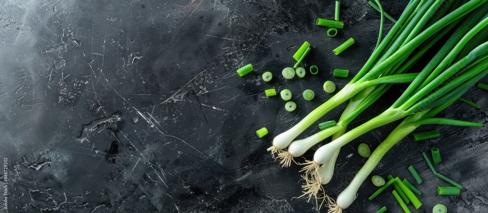 Aufkleber top view of fresh green onions on a table with copy space image
