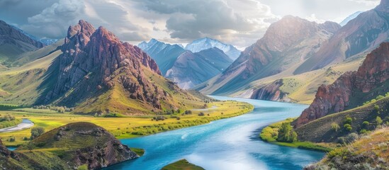 Fototapeta premium A river meandering through vibrant mountains creating a picturesque scene with copy space image