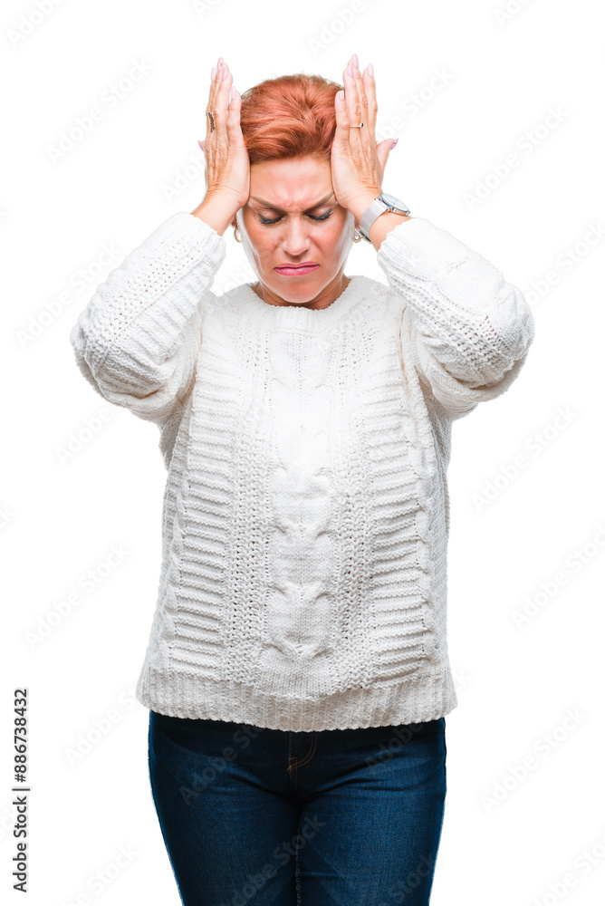 Canvas Prints Atrractive senior caucasian redhead woman wearing winter sweater over isolated background suffering from headache desperate and stressed because pain and migraine. Hands on head.