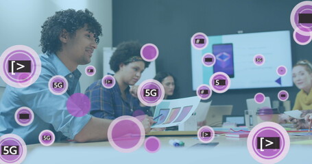 Image of multiple 5g and 4g text banners over diverse colleagues discussing together at office