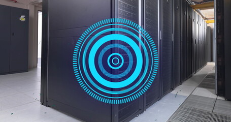 Image of blue round scanner spinning against computer server room