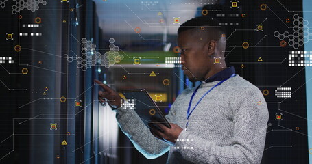 Image of data processing over african american male engineer using digital tablet at server room