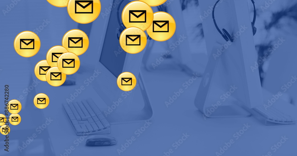 Poster image of network of email icons over computers in office