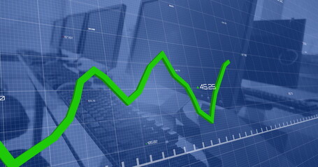 Image of green line and data processing over computers on desks in office