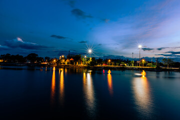 Close-up view of the natural background of the wooden bridge, which is surrounded by mangrove forests, colorful leaves of the leaves, blown through the blurred coolness during ecological travel.