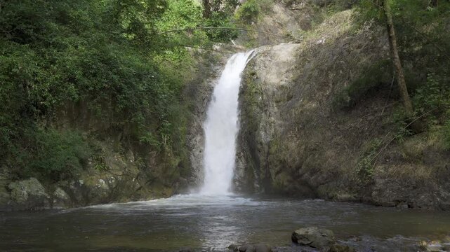 Beautiful waterfall in tropical forest in Chae Son National Park, Lampang, Thailand