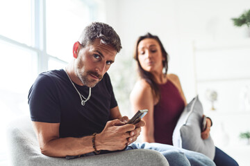 Photo of two people woman use smartphone try explain something