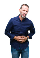 Middle age hoary senior man over isolated background with hand on stomach because nausea, painful disease feeling unwell. Ache concept.