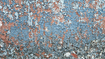 Texture of old rustic wall covered with gray and blue stucco. Multilayers of old paint on the wall....
