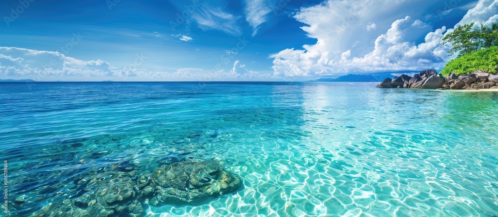 Poster stunning coastal view with clear turquoise waters offers a serene setting for a relaxing holiday wit