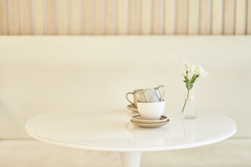 Round wooden countertop with dirty dishes on a wooden background of a modern kitchen interior with space to copy. High quality photo