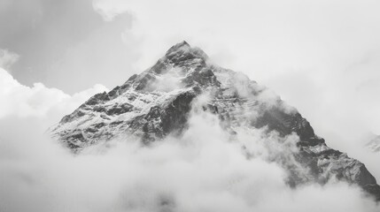 a black and white photo of a mountain covered in clouds - generative ai