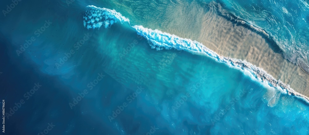 Poster aerial perspective of a serene blue ocean with paper on the surface, providing a clean copy space im