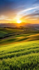 Fototapeta premium Stunning sunset over rolling green hills.