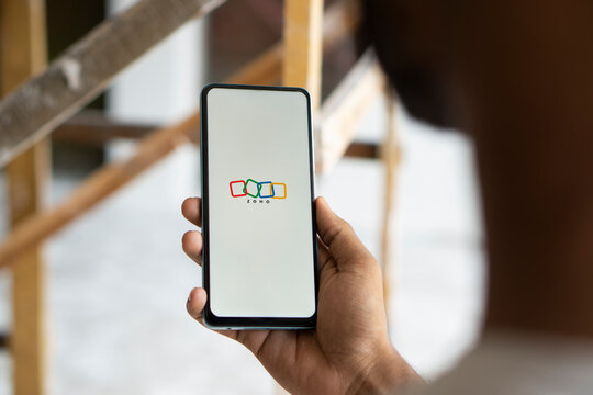 Dhaka, Bangladesh- 16 July 2024: Zoho logo is displayed on smartphone.