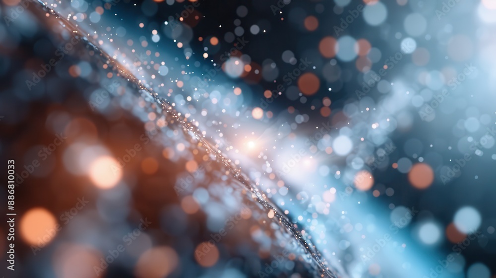 Poster a captivating abstract image featuring bokeh effect with blue and orange particles, creating a visua