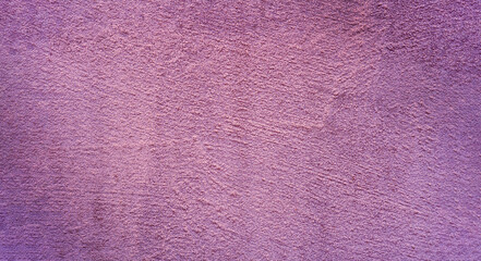 Purple textured surface with copy space