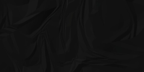 Fototapeta premium Dark black wrinkly backdrop paper background. panorama craft wrinkly paper texture background, crumpled. wrinkle wrap dirty paper crushed texture. 