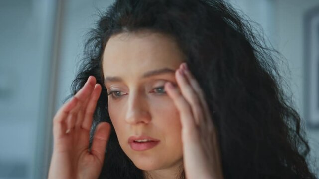 Stressed woman study documents closeup. Overwork businesswoman feeling headache