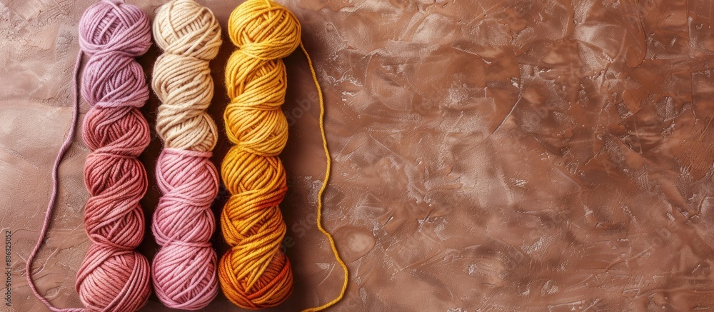 Poster six cotton cord skeins for knitting set against a beautiful background, perfect for needlework proje