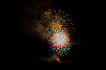 Fireworks Exploding Over the Mountains at night. Vail, Colorado