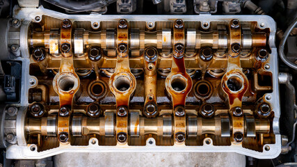 Inside the engine Under repair. Cylinder head combustion engine with camshafts, Automotive repair...