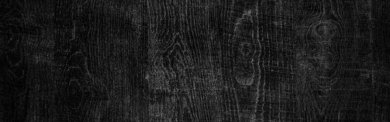 Dark black wooden background or texture