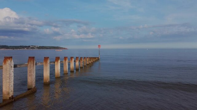 A drone view of a groyne on the beach at Dawlish Warren, guarding the mouth of the River Exe, Devon, England, United Kingdom, Europe