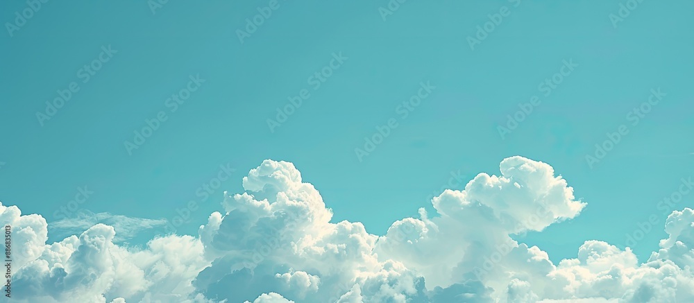 Aufkleber Blue sky with clouds provides a serene backdrop for text with copy space image.