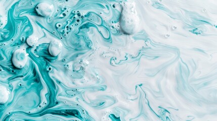 Obraz premium A detailed shot of a blue-white marble surface, adorned with water droplets atop