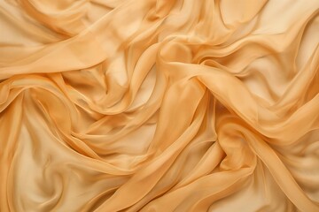 Fototapeta premium Close-up of crumpled orange fabric with textured surface. Soft focus on material, blurred background creates depth. Perfect for textile design, fashion, and interior decoration projects.