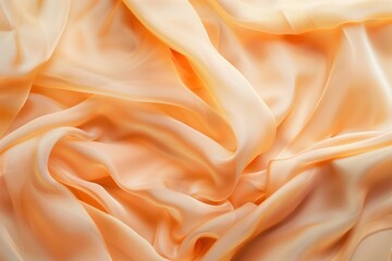 Obraz premium Orange fabric texture close-up. Vibrant orange color with slight curl adding texture to smooth surface. Blurred background focuses on intricate details of fabric.